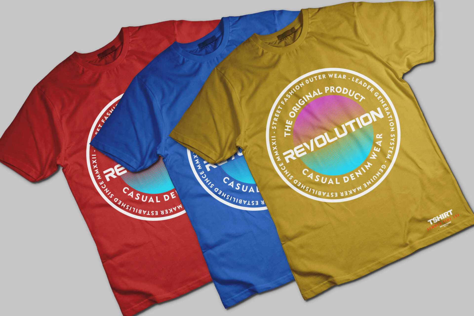 Three custom screen printed t-shirts in red, blue, and gold displaying a bold multi-color circular graphic design, showing how screen printing can handle detailed artwork with multiple ink colors for custom apparel orders