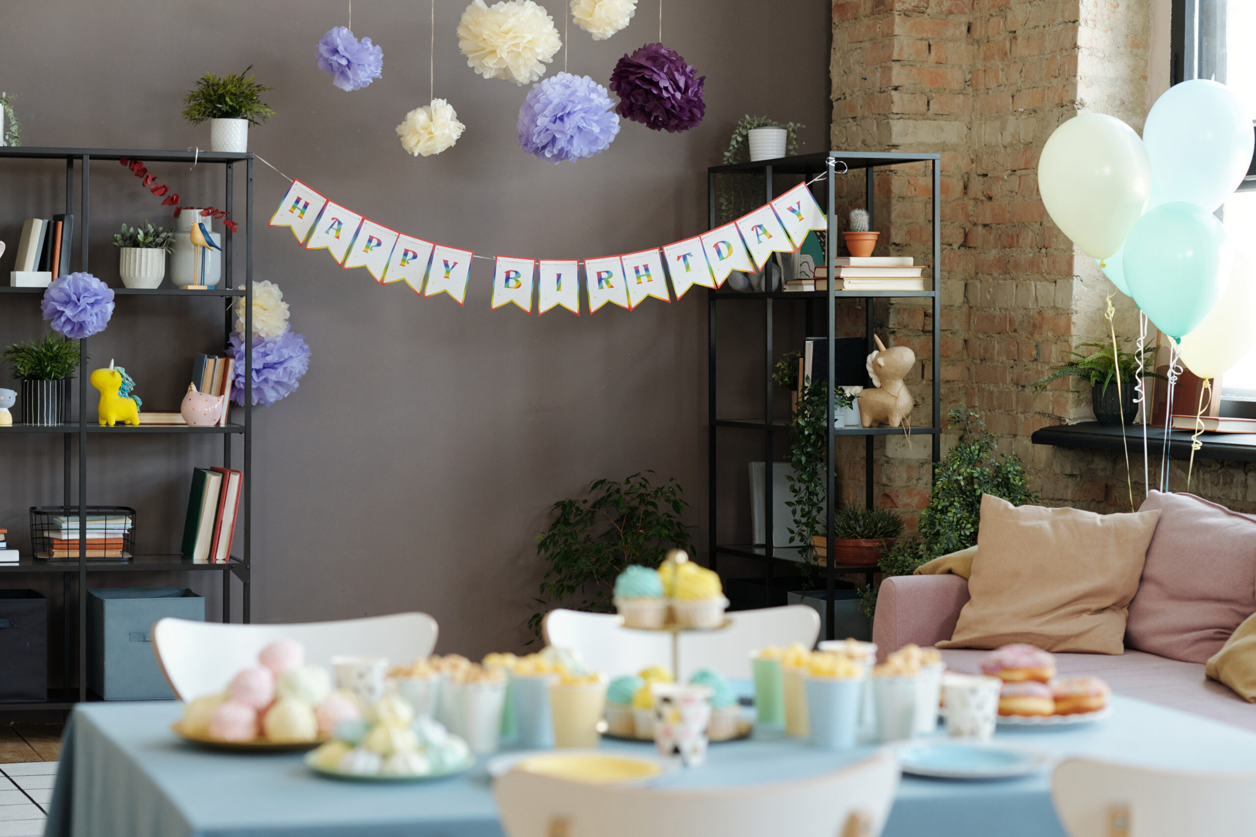 basic birthday banner hanging up at party in austin