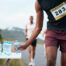 marathon runner at giveaway in austin tx choosing a water bottle
