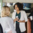 professional colleagues at event in austin tx sharing custom tumblers