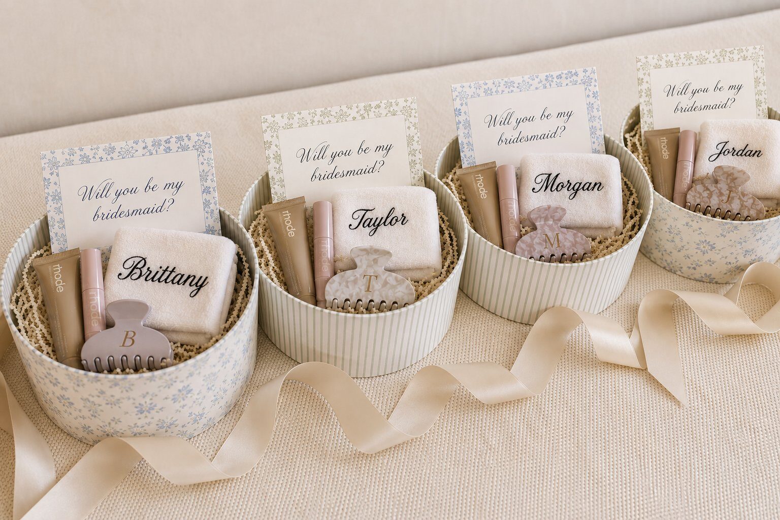 Custom bridesmaid proposal box with a matching shirt, tumbler, koozie, tote, and card in sage and cream colors.
